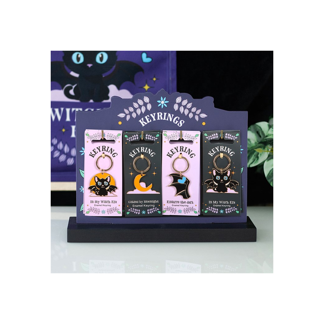 Set of 24 Cute and Creepy Keyrings on Display
