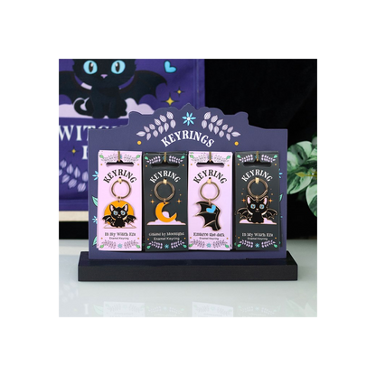 Set of 24 Cute and Creepy Keyrings on Display