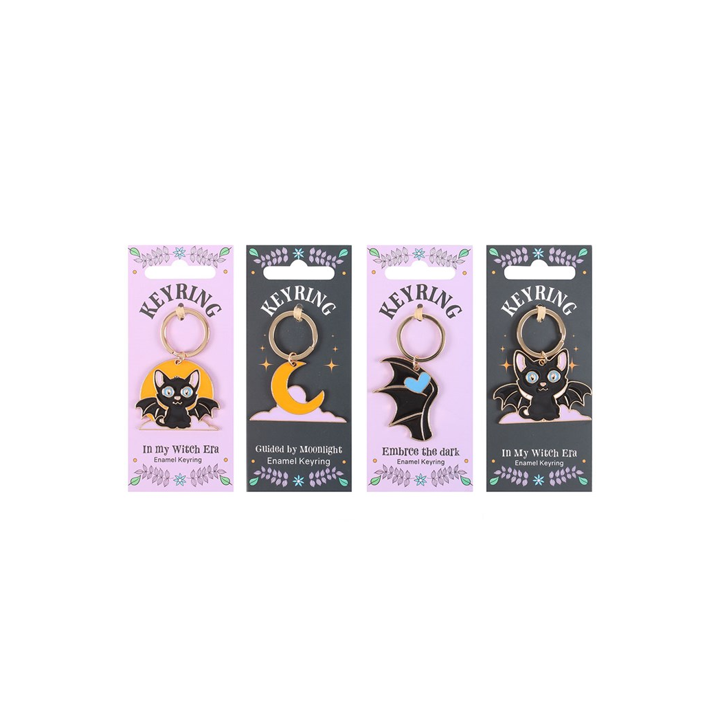 Set of 24 Cute and Creepy Keyrings on Display