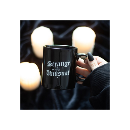 Strange and Unusual Mug