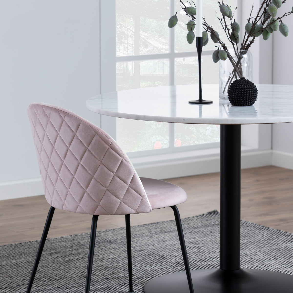 Tasmin Round Dining Table with White Polished Marble Top and Black Base