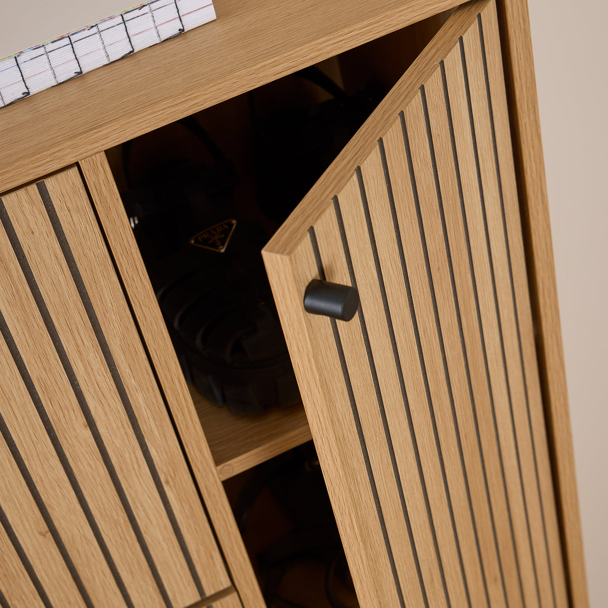 Alberto Shoe Cabinet 3 Flip Down Doors 1 Pull Open Door in Oak/Black Legs